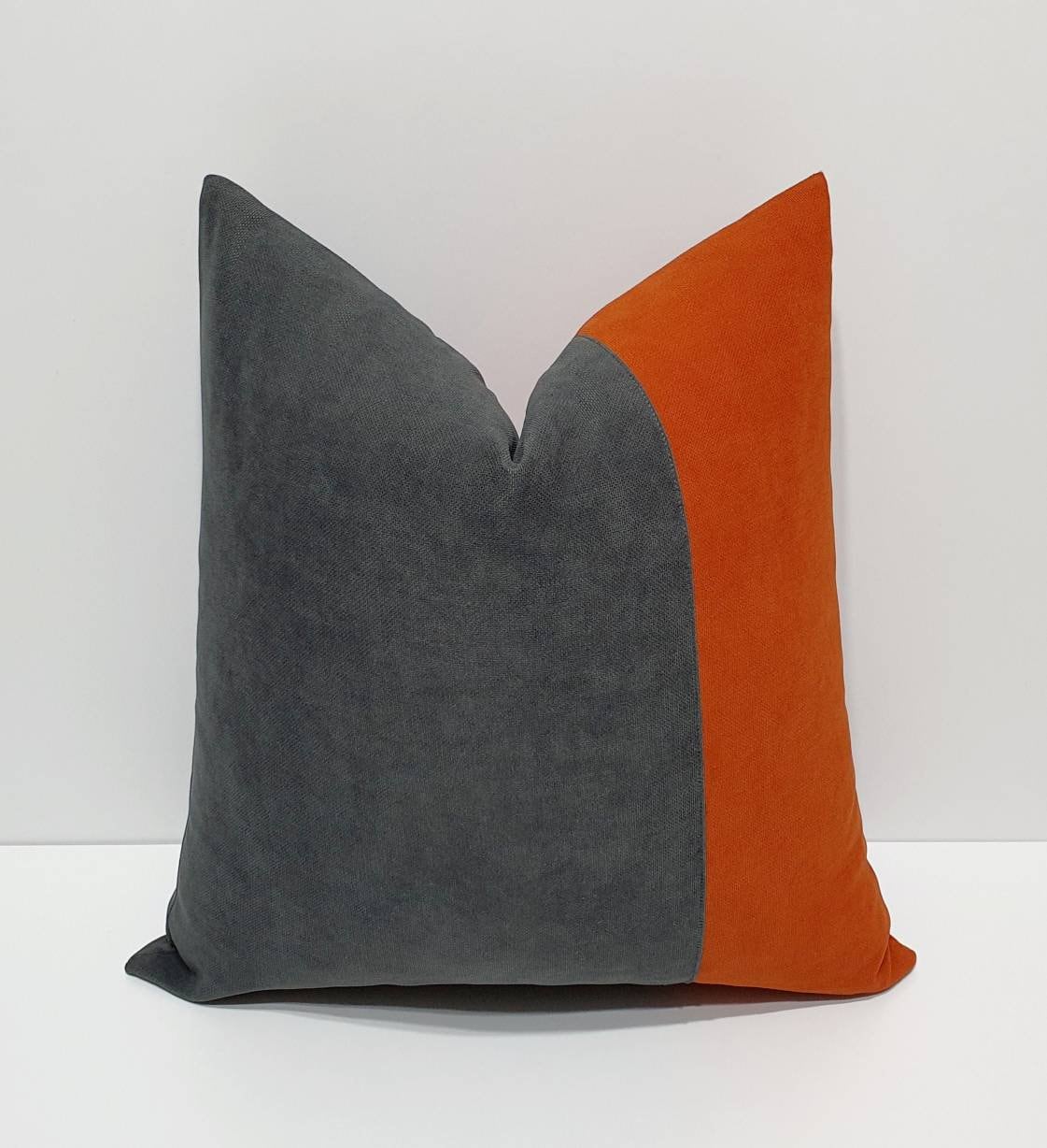 Burnt orange online and gray pillows
