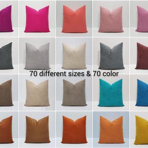 May include: A grid of twenty square throw pillows in various solid colors including shades of pink, red, gray, beige, brown, blue, orange, and yellow. The text 70 different sizes & 70 color is centered in the middle of the image display.