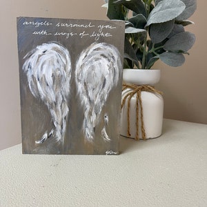 Angel wings painting on wood