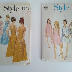 May include: Two vintage sewing pattern envelopes. The left envelope shows three women wearing dresses. The pattern number is 1952 and the bust size is 36. The right envelope shows four women wearing dresses. The pattern number is 2194 and the size is 14, bust 30.