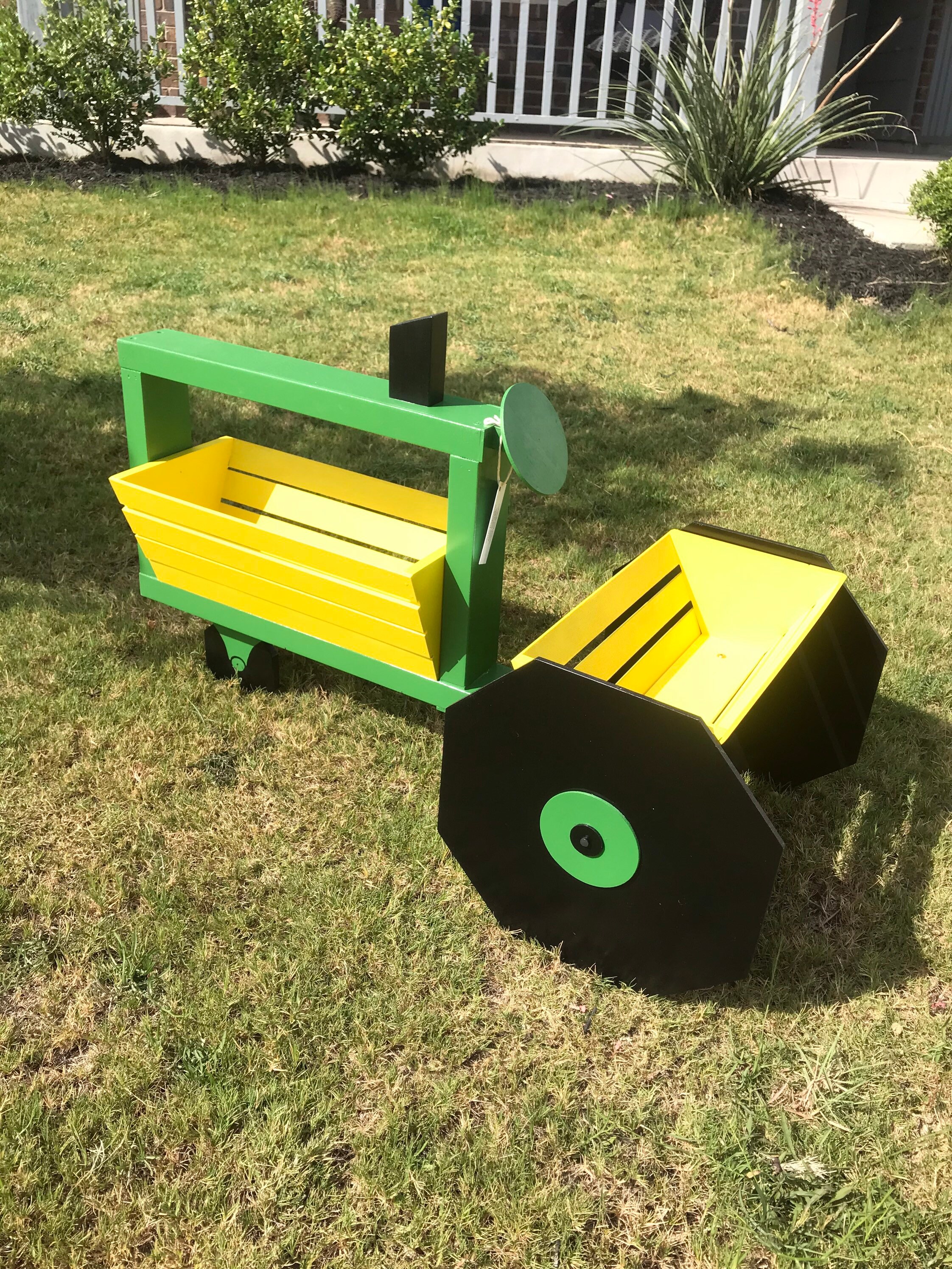 Image of Wooden tractor planter yellow