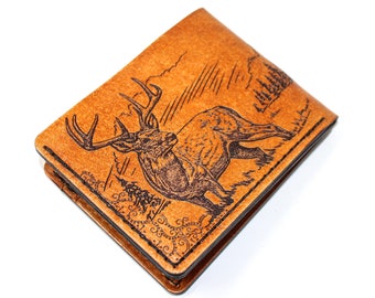 May include: A brown leather wallet with a deer design embossed on the front. The deer is facing right and has large antlers. The background is a light brown with a stylized design.