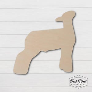 May include: A wooden cutout of a sheep in a standing pose. The sheep is made of light-colored wood and has a smooth surface. The Beck Street Woodworking logo is in the bottom right corner.