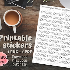 Peut inclure: Feuilles d'autocollants étoiles noires et blanches imprimables. La feuille contient 1 fichier PNG + 1 fichier PDF à télécharger à l'achat. Le texte "Autocollants imprimables" et "Create Plans" est visible sur la feuille.