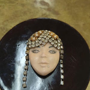 Vintage Porcelain Flapper Face Brooch Art Deco Rhinestone Headdress Dangling Pin