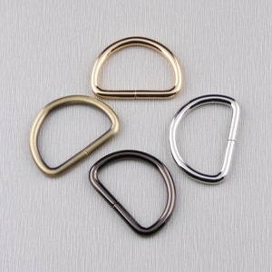 38 mm d-ring, d-spänne, väskdelar, väskbeslag, väsktillverkning, handväskbeslag, handtagsöglor, d-ringsspänne, handväsksring