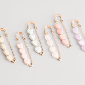 Broche de seguridad: Broches de perlas en forma de corazón para decorar, accesorio para el cinturón.