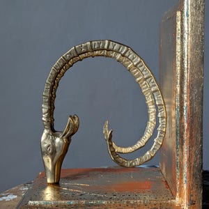 Pair of Vintage Brass Ram Bookends: Gilded Teak Base, Animal Decor