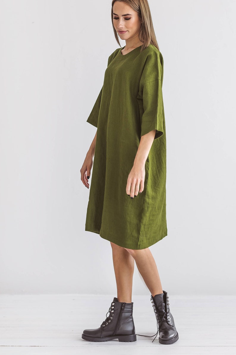 Linen dress with adjustable belt and straight fit design
