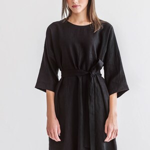 Linen dress with adjustable belt and straight fit design