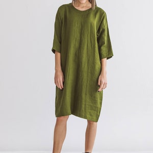 Relaxed fit linen dress with knee length hem and loose cut