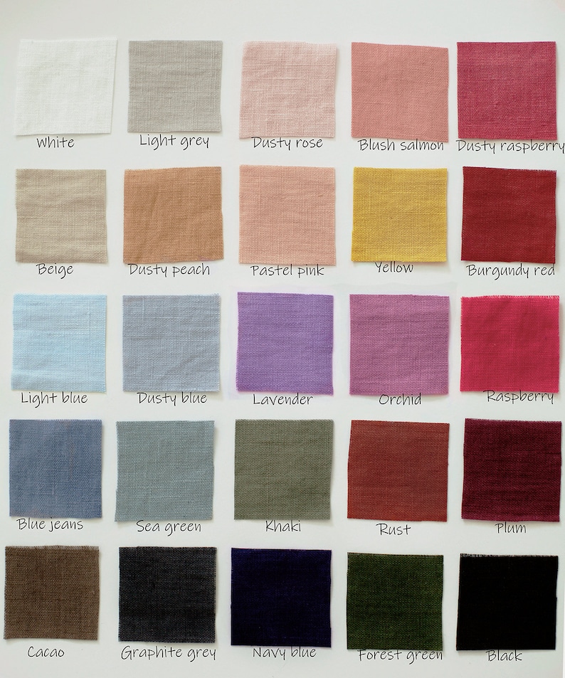 A collection of fabric swatches in various colors, including white, light grey, dusty rose, blush salmon, and dusty raspberry. Each swatch is labeled with its color name, showcasing a range of hues from light to dark.