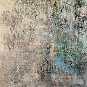 May include: Abstract painting with a textured, layered surface. The painting features shades of gray, blue, green, and gold. The paint is applied in a thick, impasto style, creating a three-dimensional effect.