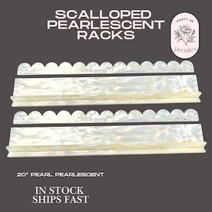 May include: Scalloped pearl pearlescent racks, 50.8 cm long, with a scalloped top edge. The racks are white with a pearlescent finish. The text on the image says "In Stock Ships Fast". A logo for "Party in Peonies" is in the upper right corner.