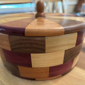 segmented wooden bowl with lid.  Turned wood bowl. Decorative artwork wood storage container with lid.