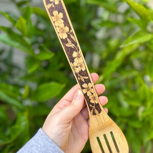 Wood burned wooden utensil. Wooden utensil with floral wood burned design.