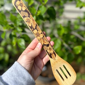 Floral wood burned wooden kitchen utensil