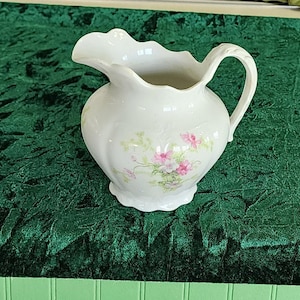 Vintage Antique Ironstone Transferware  Medium Pitcher with Pink Flowers Green Leaves. 6 1/2 inches tall and hold 2 3/4 cups.