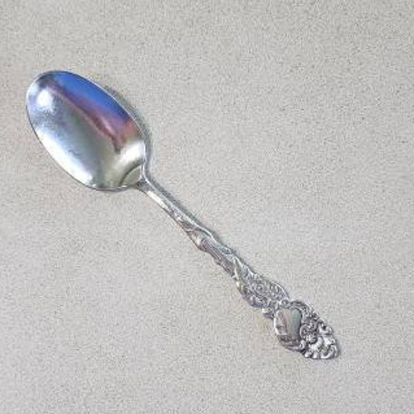 Antique 1893 COLUMBIA Teaspoon by 1847 Rogers Brothers. No dents or bends but does have silver loss on heel. Beautiful pattern and patina.