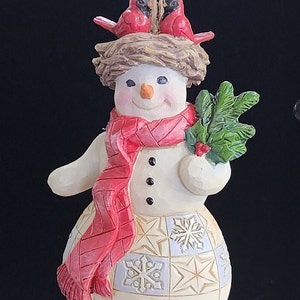 Jim Shore Christmas Ornament 'Snowman with Cardinal Nest'. 4 1/2 inches tall, New in Box with Tags.