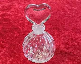 Vintage Spiral Crystal Perfume Bottle with Glass Heart Shaped Stopper. 3 1/2 inches without stopper and 5 1/2 inches with stopper.