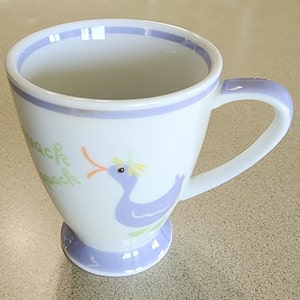 Vintage Starbucks 2007 Duck Quack Spring Cup Holds 7 ounces Demitasse Tea  Espresso Lilac Lavender Green 3 1/2 inches tall. No damage.