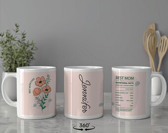 May include: Three pink ceramic mugs with white text and designs. The mug on the left has a floral design and the text "Best Mom Ever". The mug in the middle has the name "Jennifer" printed on it. The mug on the right has the text "Best Mom" and a list of "Nutritional Facts" with a humorous description of a mother's qualities.