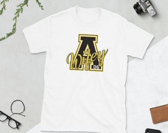 black and yellow bape shirt