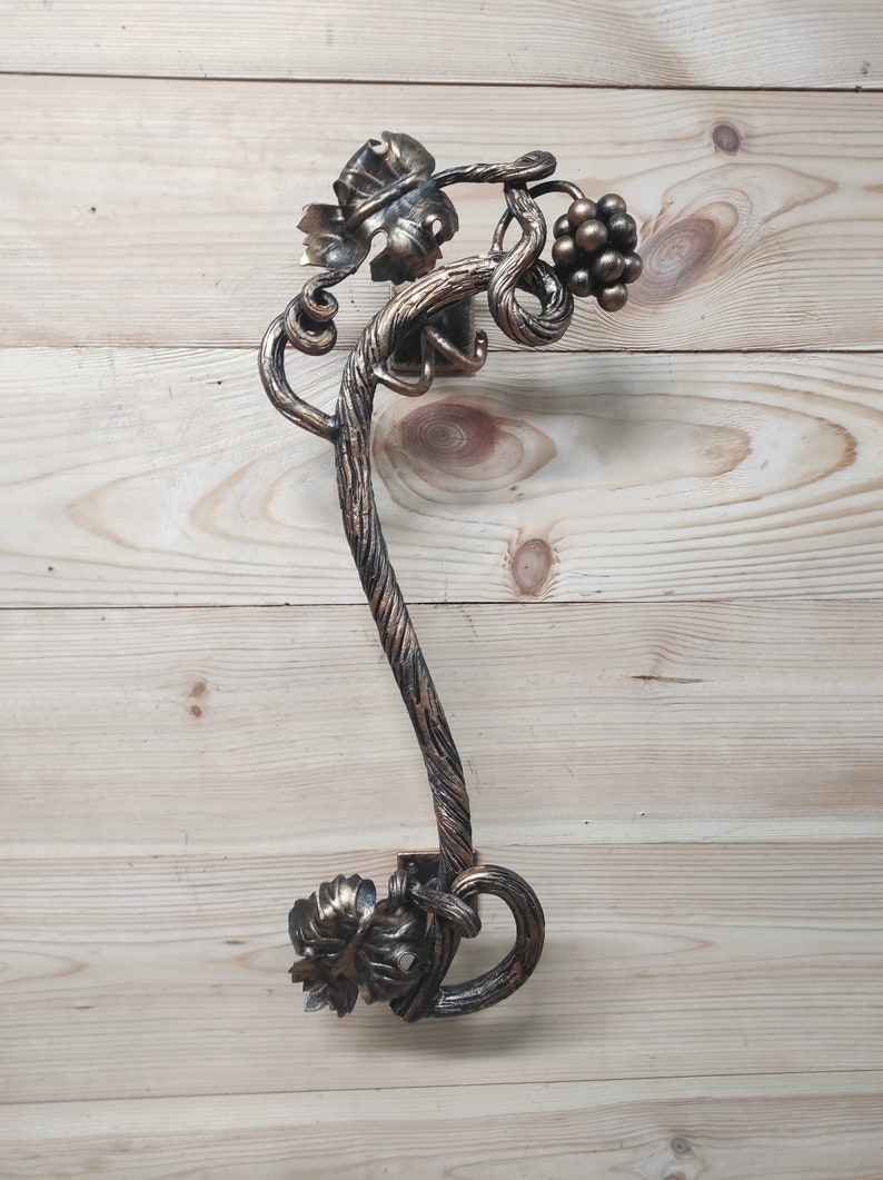 Handgeschmiedeter Türgriff aus Schmiedeeisen: Zweigdesign Bild 8