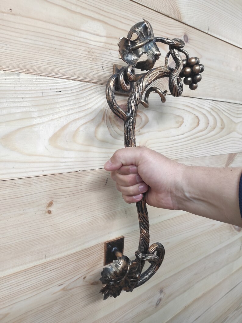 Handgeschmiedeter Türgriff aus Schmiedeeisen: Zweigdesign Bild 6