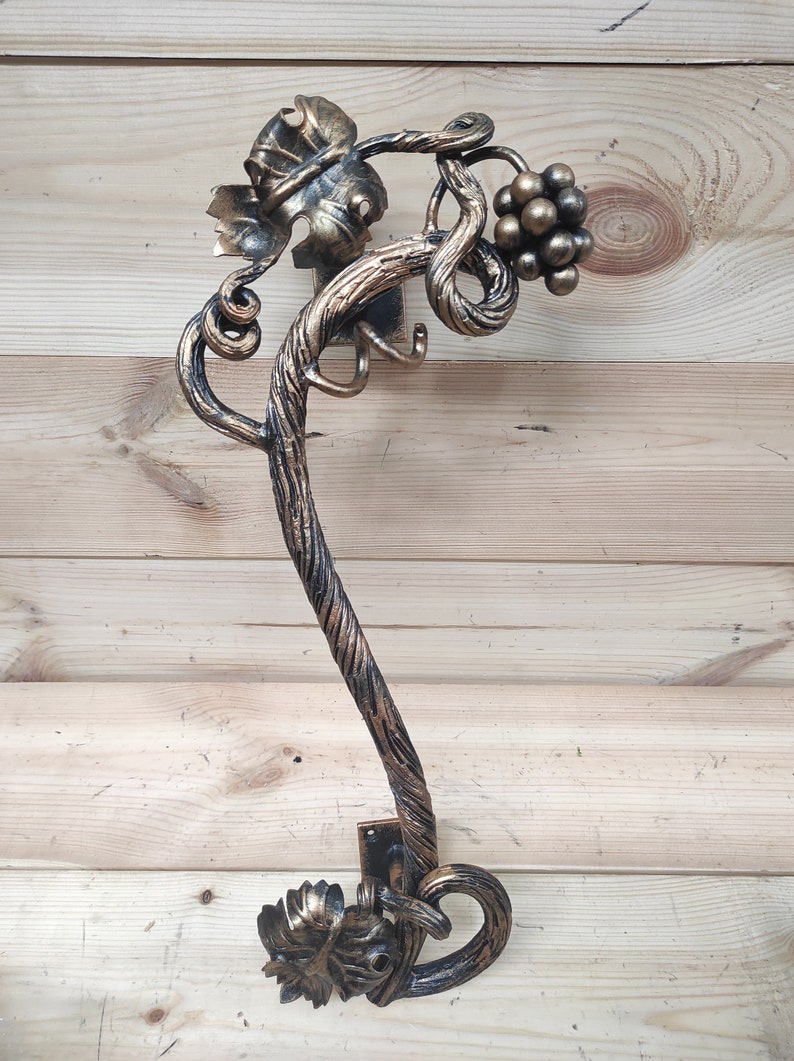 Handgeschmiedeter Türgriff aus Schmiedeeisen: Zweigdesign Bild 10