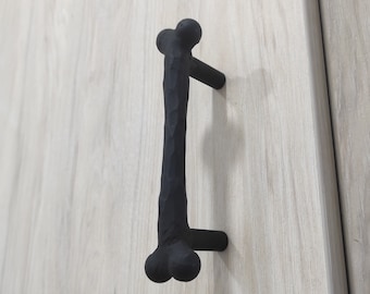 Tirador de puerta hecho a mano con forma de hueso: pomo de metal negro para armario