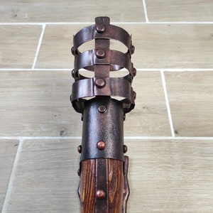 Medieval torch, wrought iron sconce