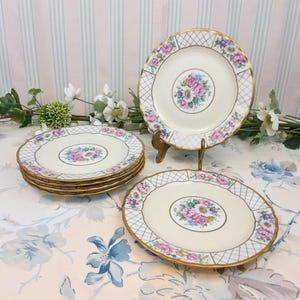 6 Bernardaud dessert plates
