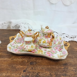 Porcelain doll tea set