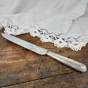 Couteau en métal argenté Christofle, modèle Aria avec