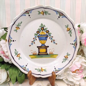 19th century plate decorated with a yellow urn