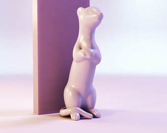 May include: A light pink ceramic sculpture of a standing animal with crossed arms, positioned next to a purple rectangular shape. The sculpture has a smooth, glossy finish and is set against a gradient background of white and pink.