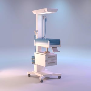 May include: A white medical infant warmer station featuring a blue padded bassinet, two storage drawers, a vertical support column with an overhead heating lamp, an integrated IV pole, and a mobile base equipped with four caster wheels.