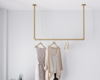 Golden Minimalist Clothes Rack | Garment Rail made of metal mounted on the ceiling Ceiling Clothing rack