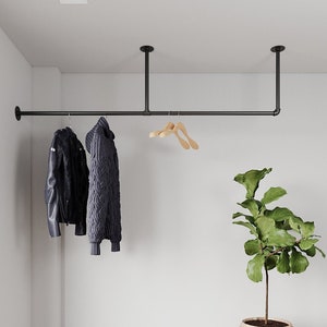 Minimalistic Clothes Rack | Garment Rail made of metal mounted on the ceiling Ceiling Clothing rack