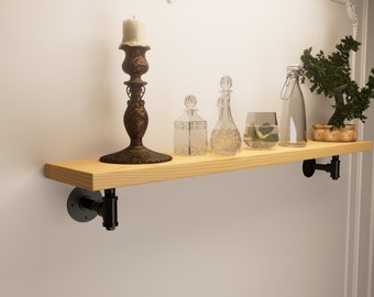 Reclaimed shelf with pipe Brackets handcrafted from solid timber 3.3cm thickness and 22.5cm depth.