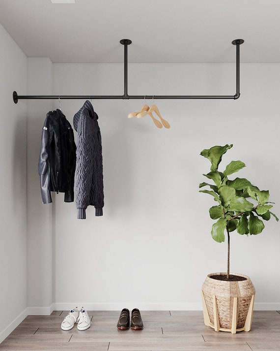 Minimalistic Clothes Rack Garment Rail Made of Metal Mounted on