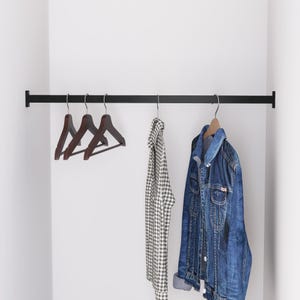 Minimalist Wall-Mounted Clothing Rail – Modern Black Steel Wardrobe BarMinimalist Wall-Mounted Clothing Rail Modern Black Steel Wardrobe Bar