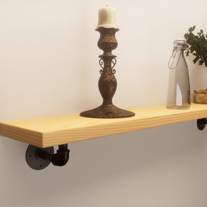 Reclaimed shelf with Brackets handcrafted from solid timber with industrial iron metal brackets 3.3cm thickness and 22.5cm depth.
