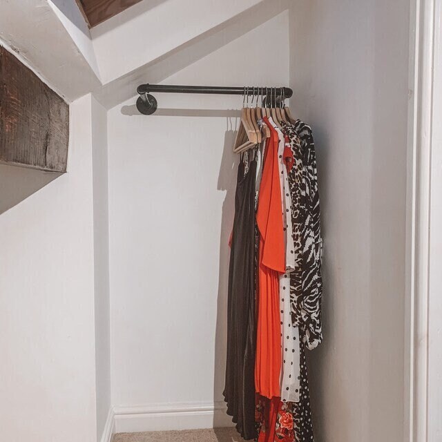 Clothes rail for sloping ceiling hot sale