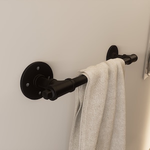 Black Industrial Style Towel Rack featuring a Metal Towel Rail designed like Pipe Fittings for a Unique Touch in the Industrial Bathroom