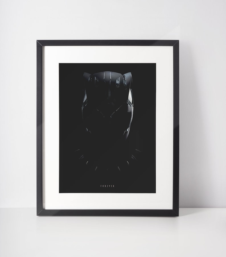 May include: Black and white minimalist poster featuring a silhouette of Black Panther's mask with the word "FOREVER" printed below.