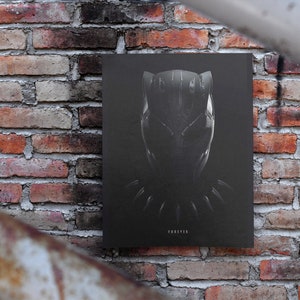 May include: Black and white poster featuring a close-up of Black Panther's mask with the word "FOREVER" at the bottom.