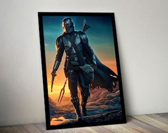 May include: A black and silver Mandalorian helmet with a green and brown creature in a pouch on the front. The Mandalorian is wearing a black and silver suit of armour and is holding a blaster rifle in his right hand. The background is a desert landscape with a sunset in the distance.